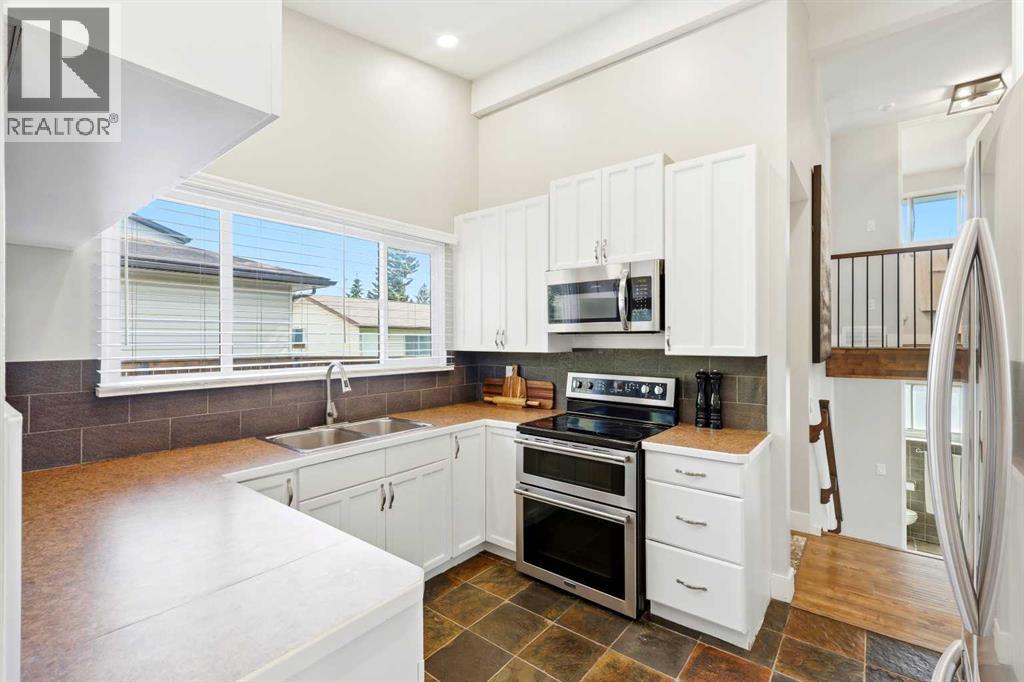 2516 63 Avenue SW, Calgary, Alberta  T3E 5J5 - Photo 11 - A2324720