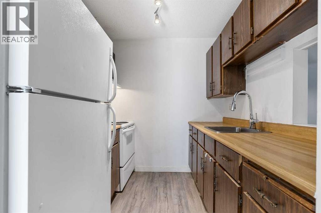 123, 10120 Brookpark Boulevard SW, Calgary, Alberta  T2W 3G3 - Photo 11 - A2325982