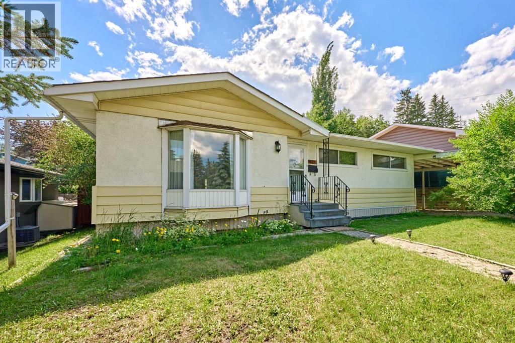 627 94 Avenue SW, Calgary, Alberta  T2V 0X8 - Photo 1 - A2327720