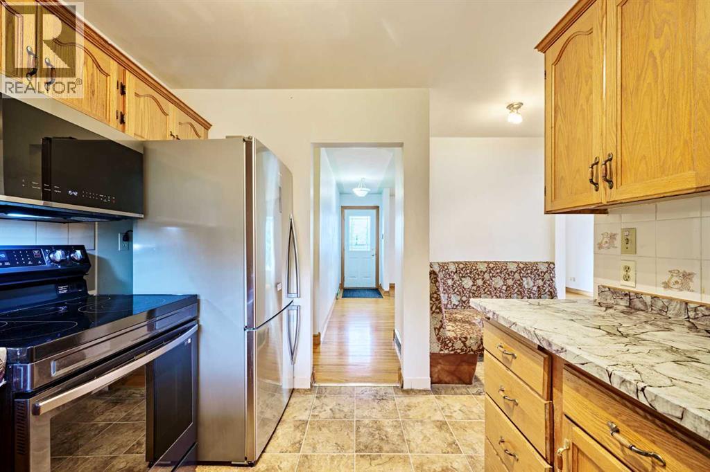 627 94 Avenue SW, Calgary, Alberta  T2V 0X8 - Photo 13 - A2327720