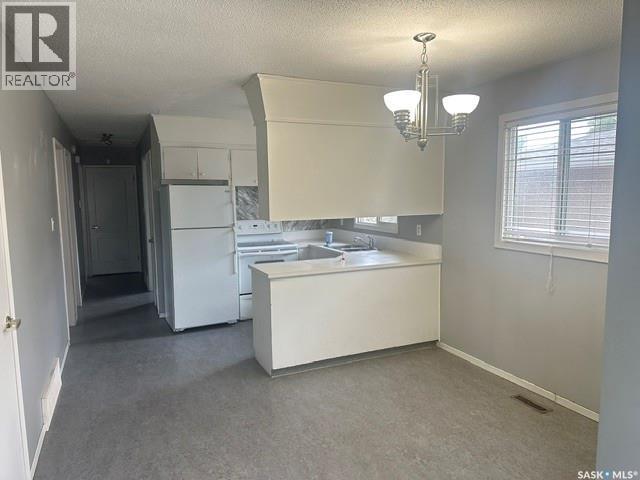 724 Eastview Avenue, Regina, Saskatchewan  S4N 0A2 - Photo 3 - SK044406