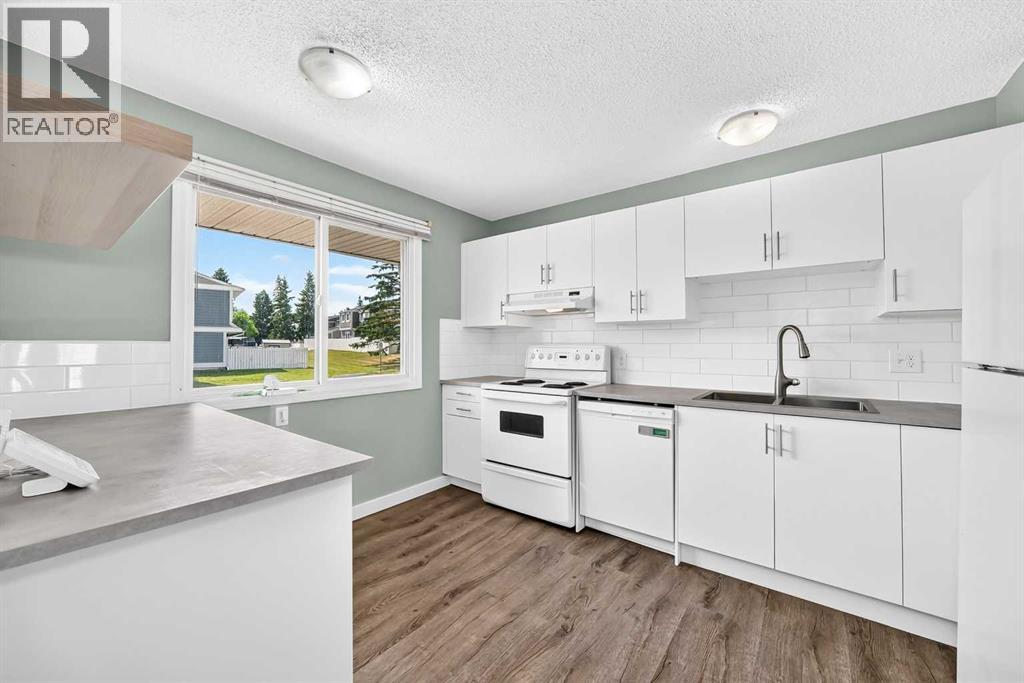 383 Georgian Villas NE, Calgary, Alberta T2A 7E1 - Photo 3 - A2333692