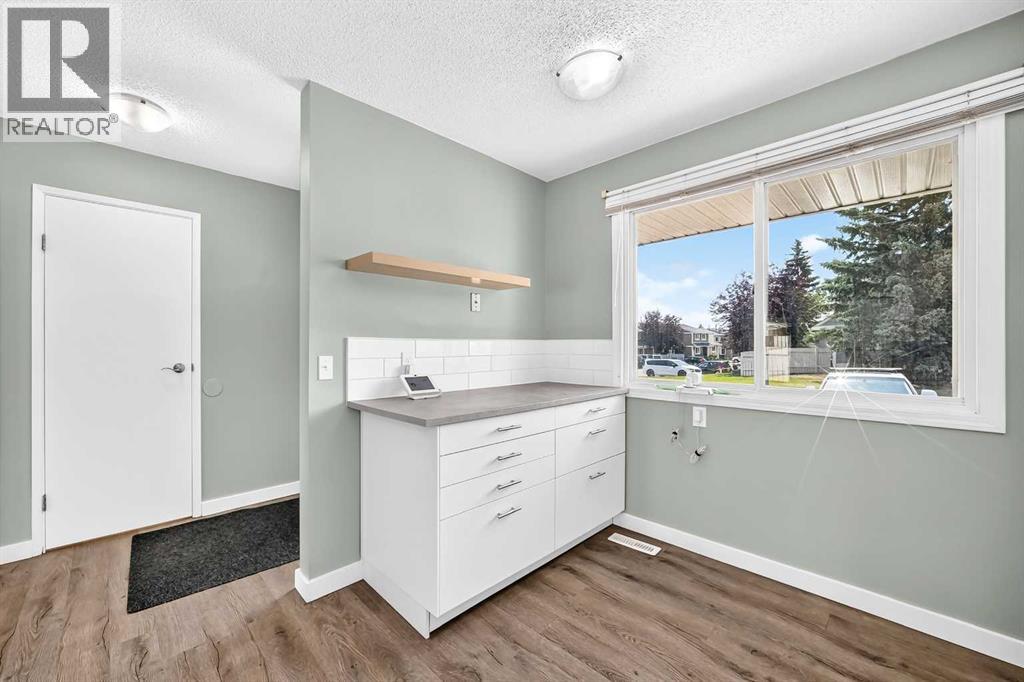 383 Georgian Villas NE, Calgary, Alberta T2A 7E1 - Photo 5 - A2333692