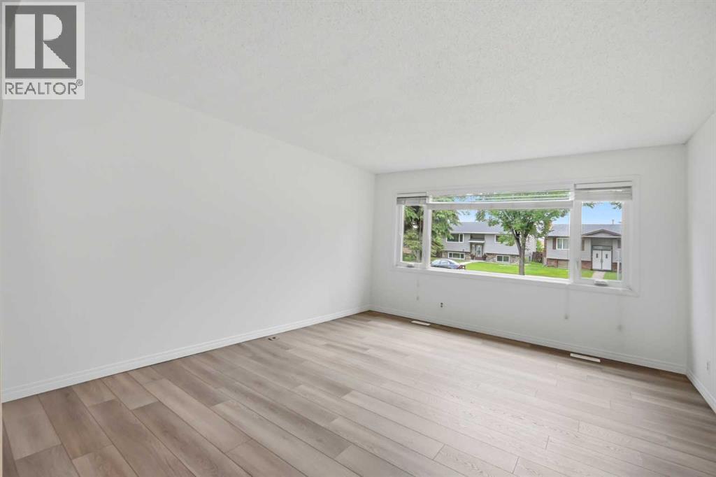 5608 Rundlehorn Drive NE, Calgary, Alberta  T1Y 3J2 - Photo 5 - A2325345