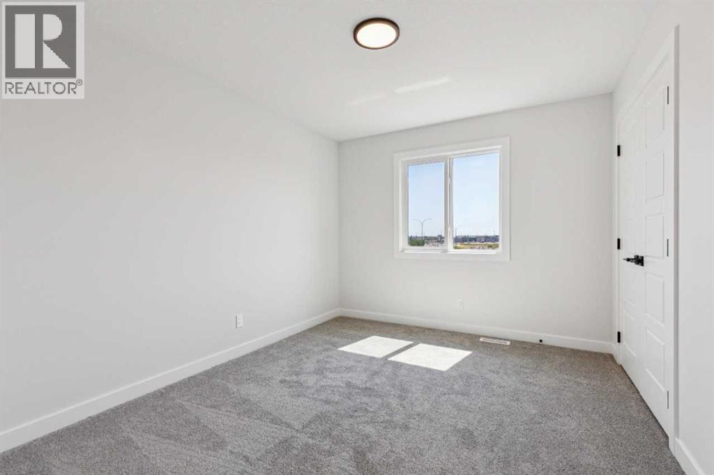 58 Bridgeport Circle, Chestermere, Alberta  T1X 3E9 - Photo 31 - A2324721