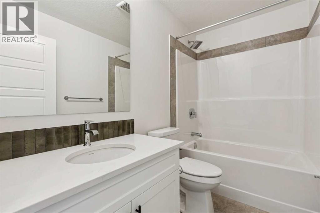 58 Bridgeport Circle, Chestermere, Alberta  T1X 3E9 - Photo 37 - A2324721