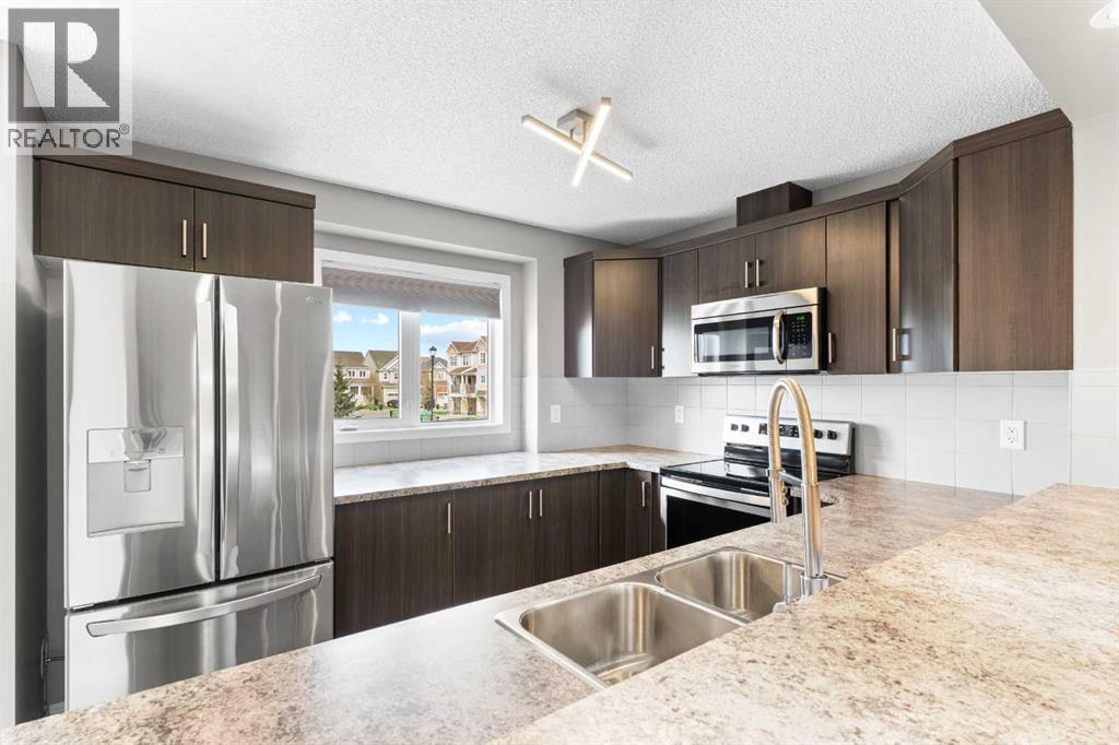 132 Windford Grove SW, Airdrie, Alberta  T4B 4A5 - Photo 5 - A2308026