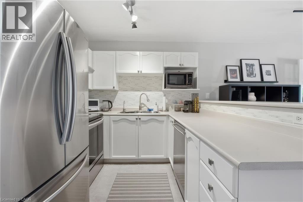 1421 Walkers Line Unit# 209, Burlington, Ontario  L7M 4P4 - Photo 6 - 40833749