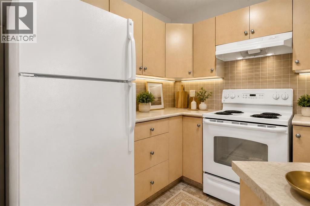 7103, 304 Mackenzie Way SW, Airdrie, Alberta  T4B 3H7 - Photo 6 - A2329709