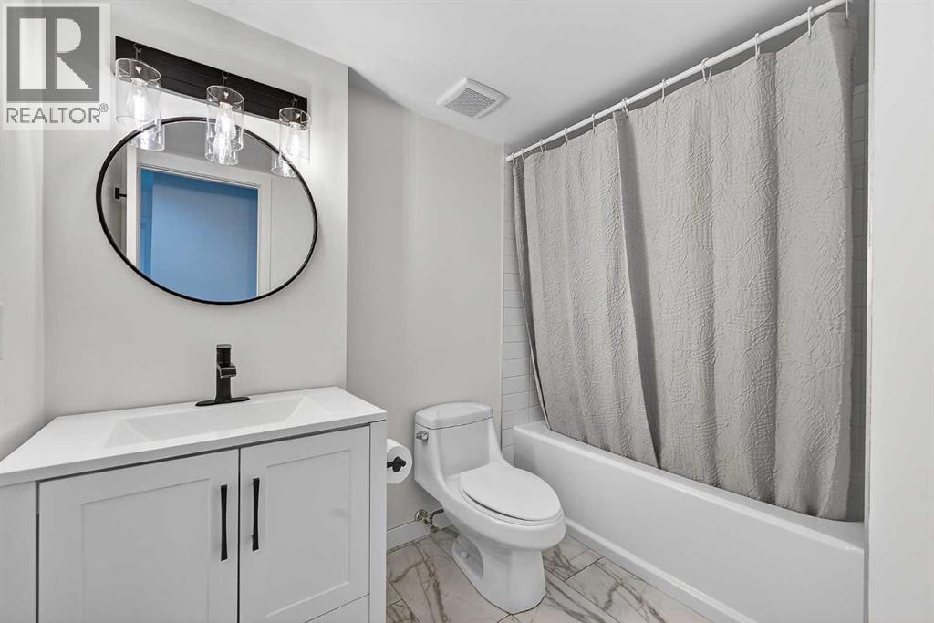 1091 Berkley Drive NW, Calgary, Alberta  T3K 1S6 - Photo 21 - A2329717
