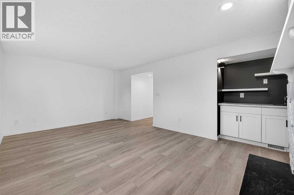 1091 Berkley Drive NW, Calgary, Alberta  T3K 1S6 - Photo 25 - A2329717