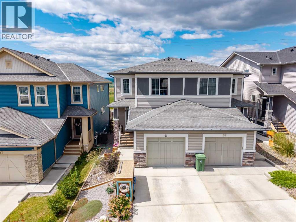91 Heritage Heights, Cochrane, Alberta  T4C 2R4 - Photo 1 - A2334139