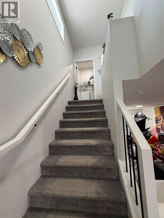 41 Edith Gate NW, Calgary, Alberta  T3R 1Z3 - Photo 29 - A2333235