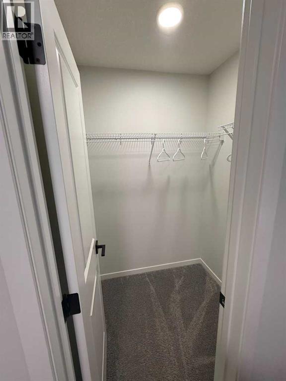 41 Edith Gate NW, Calgary, Alberta  T3R 1Z3 - Photo 17 - A2333235