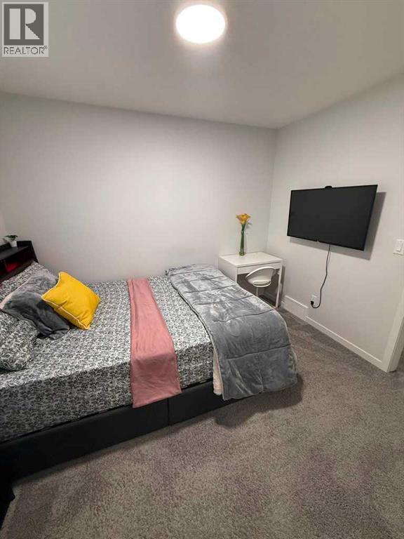41 Edith Gate NW, Calgary, Alberta  T3R 1Z3 - Photo 16 - A2333235