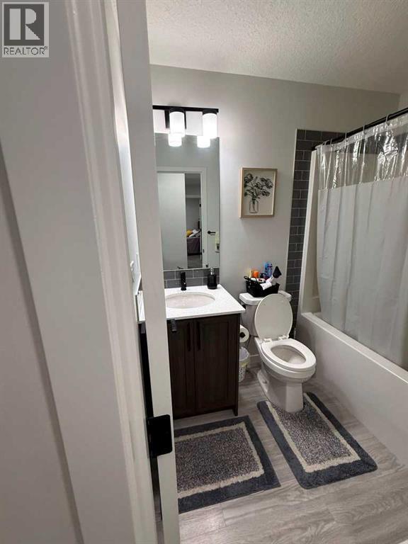 41 Edith Gate NW, Calgary, Alberta  T3R 1Z3 - Photo 18 - A2333235