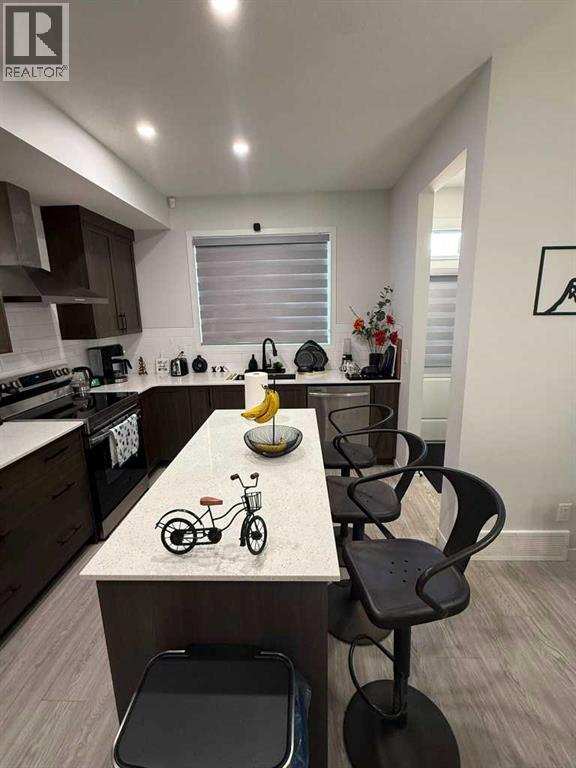 41 Edith Gate NW, Calgary, Alberta  T3R 1Z3 - Photo 37 - A2333235