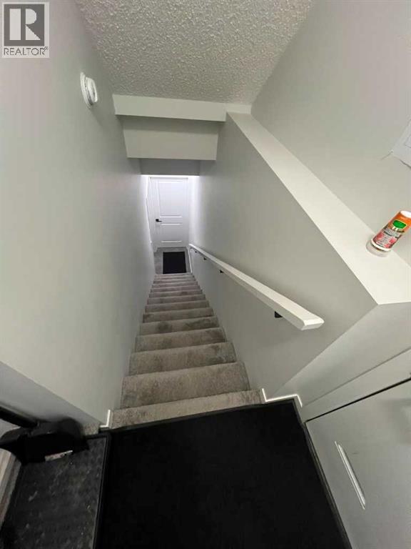 41 Edith Gate NW, Calgary, Alberta  T3R 1Z3 - Photo 39 - A2333235