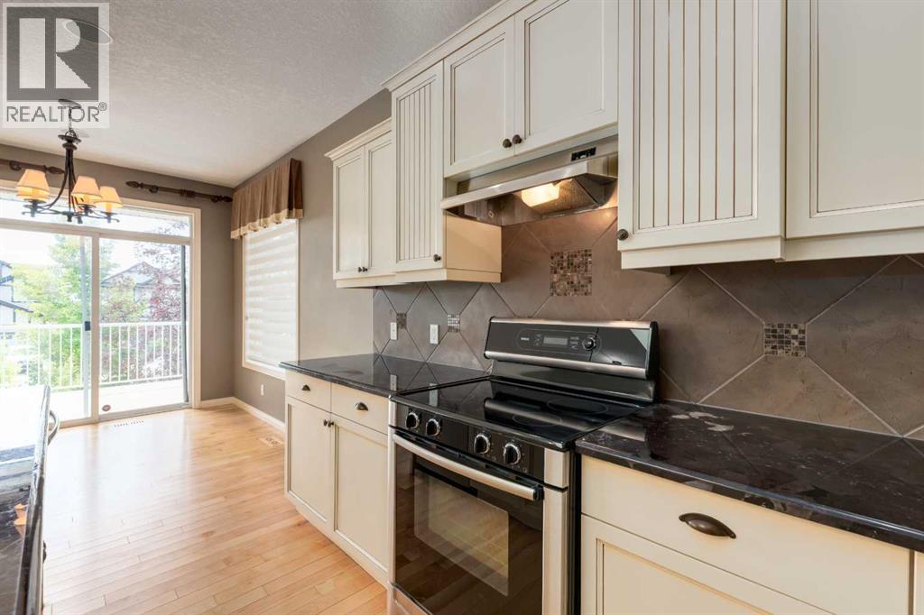 4 Sunset Close, Cochrane, Alberta  T4B 0B3 - Photo 9 - A2334382
