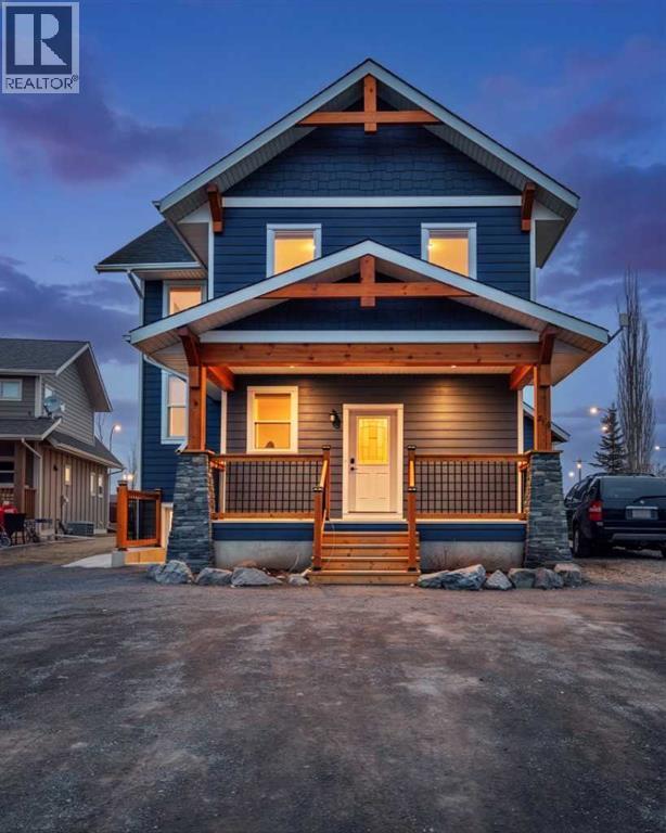 216 Cottageclub Crescent, Rural Rocky View County, Alberta  T4C 1B1 - Photo 3 - A2302814