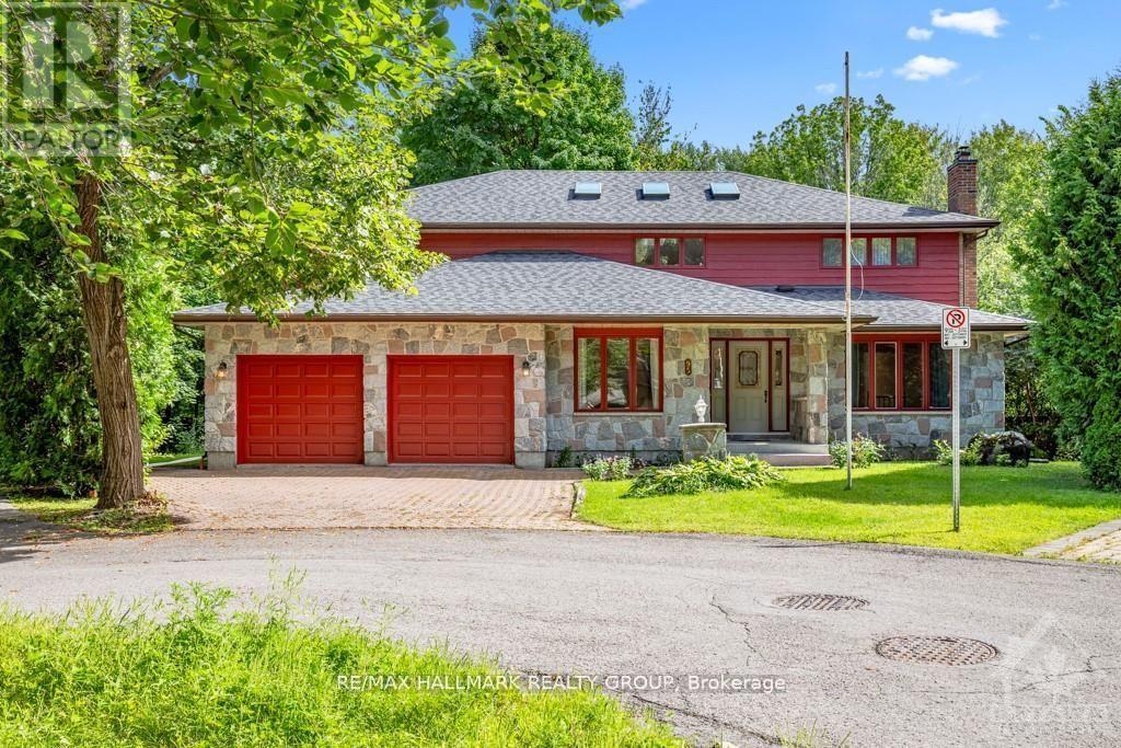 95 MACNABB PLACE, a stately Rockcliffe residence, is ideal for ambassadors, senior diplomats or executives. This spacious executive style home features a marble floor entrance hall with an open circular oakwood staircase, 6 bedrooms and 5 bathrooms. The main floor includes large living and dining rooms and family room- all with strip oak hardwood floors, as well as a den/office, full bathroom, guestroom/nanny's quarters. The kitchen features loads of cabinetry, granite counter tops, and 2 cook tops. The upper level includes a large master bedroom with an ensuite full bathroom, as well as 3 other bedrooms and 2 bathrooms. The finished lower level offers an additional attractive entertainment area with a hardwood dance floor and bar, a bedroom and full bathroom, a sauna, and plenty of storage space. All this plus close to all conveniences, quality schools, downtown locations while being on a child safe cul-de-sac in a mature neighborhood on a tree-lined street. (id:48254)