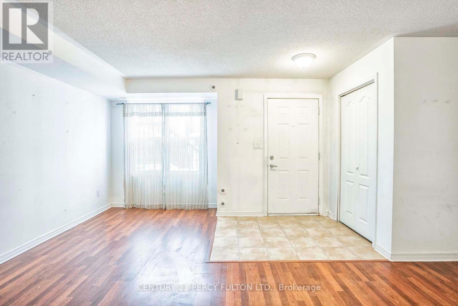 101 - 45 Strangford Lane, Toronto, Ontario  M1L 0E5 - Photo 4 - E13639196