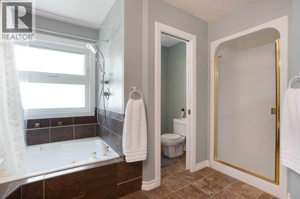 128 Waterstone Place SE, Airdrie, Alberta  T4B 2G1 - Photo 19 - A2331494