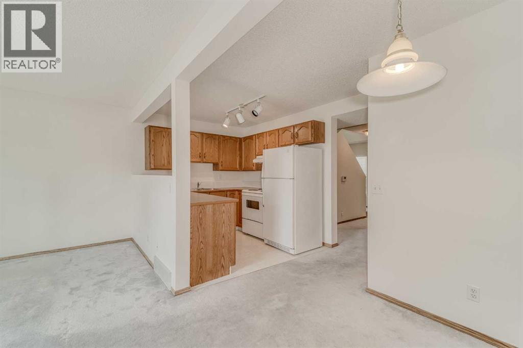 15 Harvest Glen Heights NE, Calgary, Alberta  T3K 4L3 - Photo 14 - A2334476