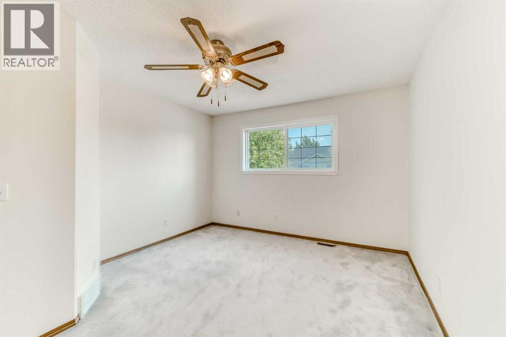 15 Harvest Glen Heights NE, Calgary, Alberta  T3K 4L3 - Photo 23 - A2334476
