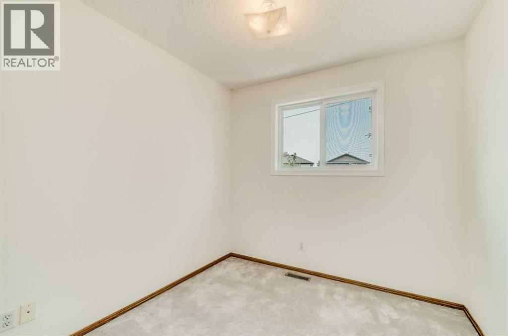 15 Harvest Glen Heights NE, Calgary, Alberta  T3K 4L3 - Photo 31 - A2334476