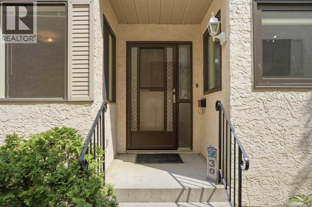 30 Sandarac Circle NW, Calgary, Alberta  T3K 3G7 - Photo 2 - A2334361