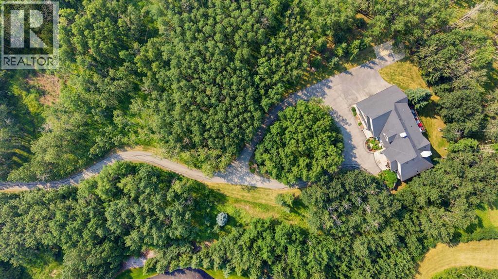 31250 Woodland Way, Rural Rocky View County, Alberta  T3R 1G5 - Photo 49 - A2334707