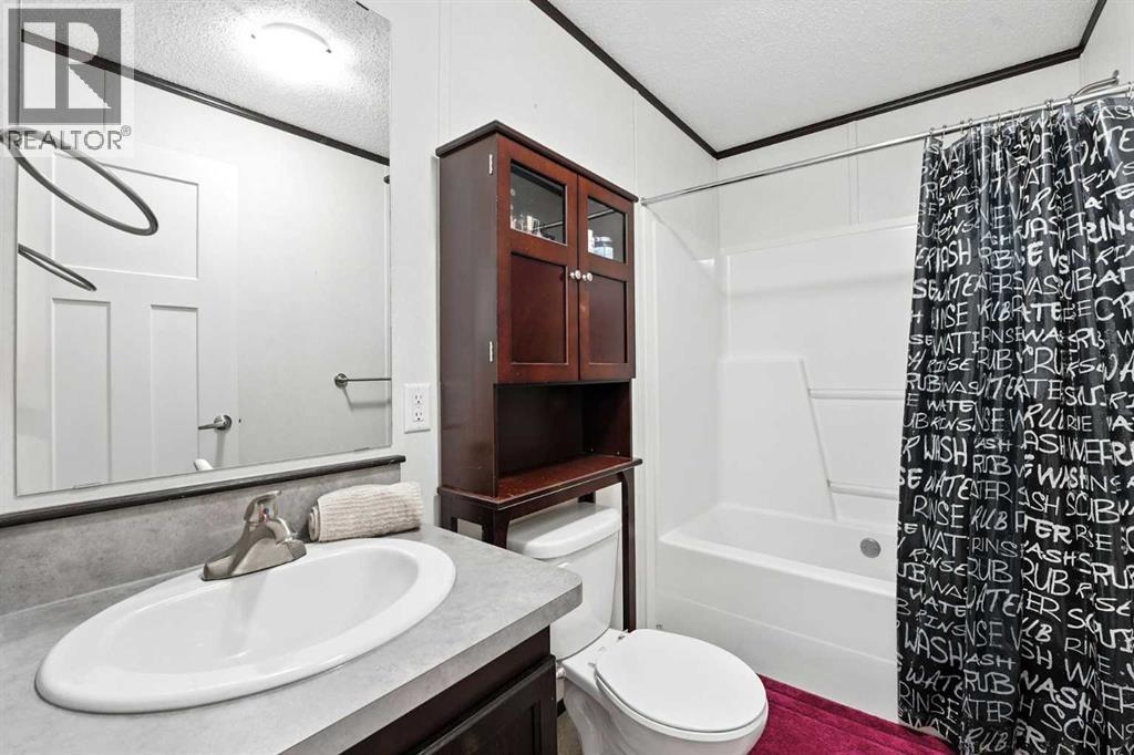 113 Heritage Drive, Okotoks, Alberta  T1S 1M4 - Photo 7 - A2299136