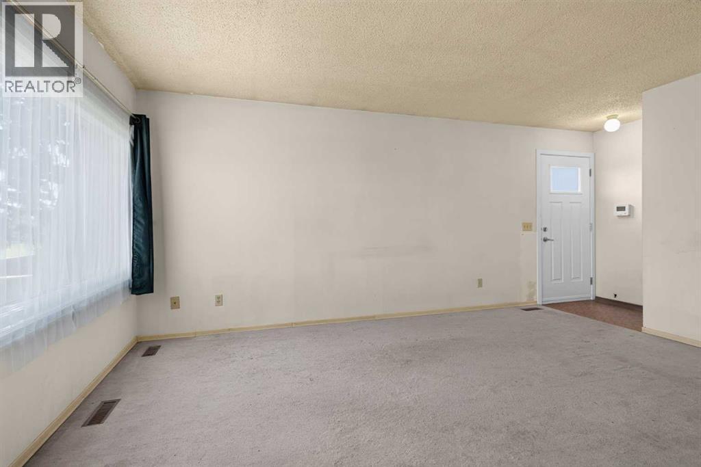 359 Maitland Crescent NE, Calgary, Alberta  T2A 5T6 - Photo 4 - A2324058