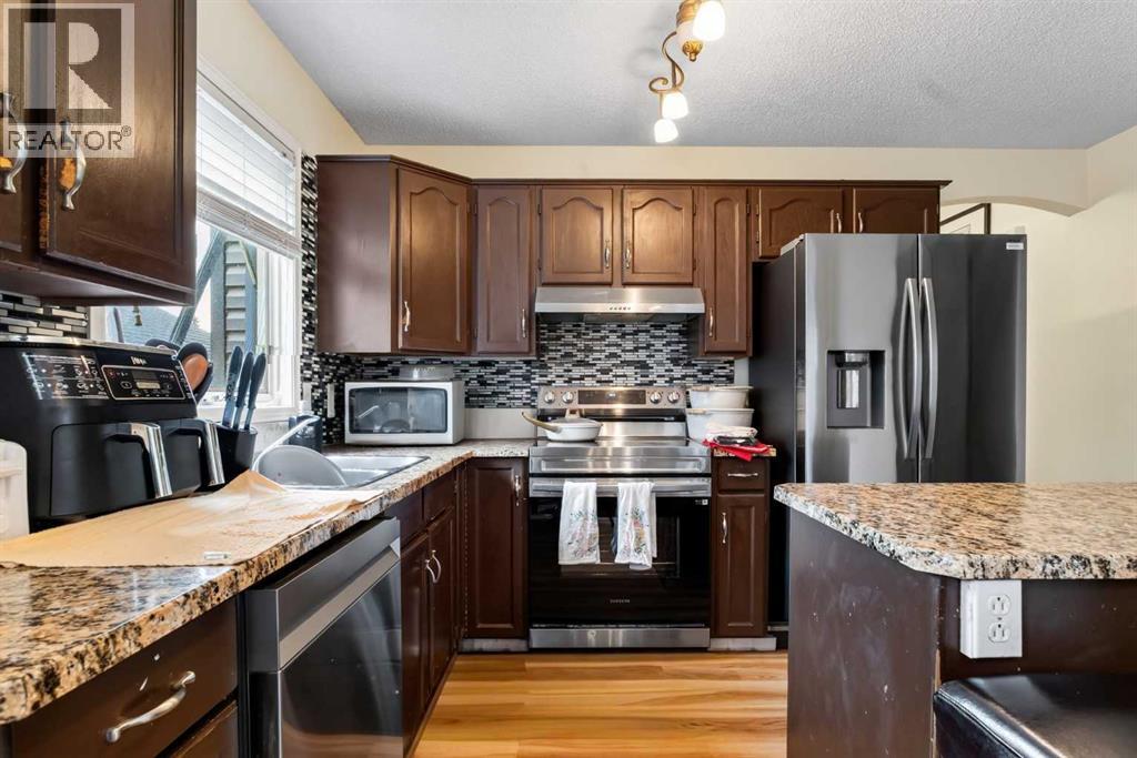 403 Shawinigan Drive SW, Calgary, Alberta  T2Y 3A2 - Photo 9 - A2332037