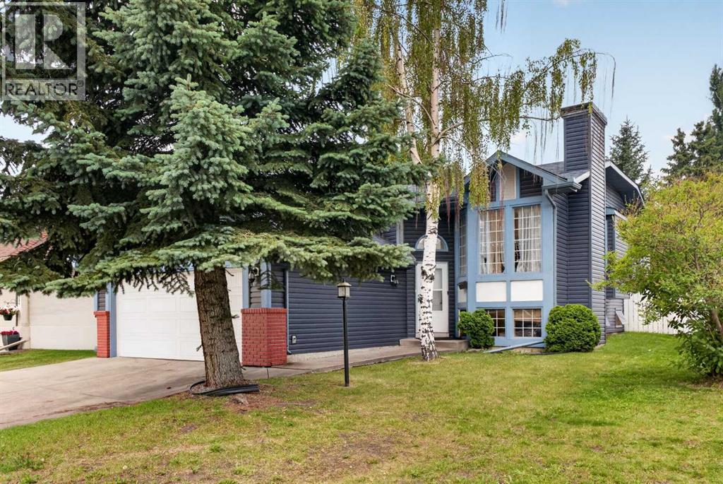 403 Shawinigan Drive SW, Calgary, Alberta  T2Y 3A2 - Photo 2 - A2332037