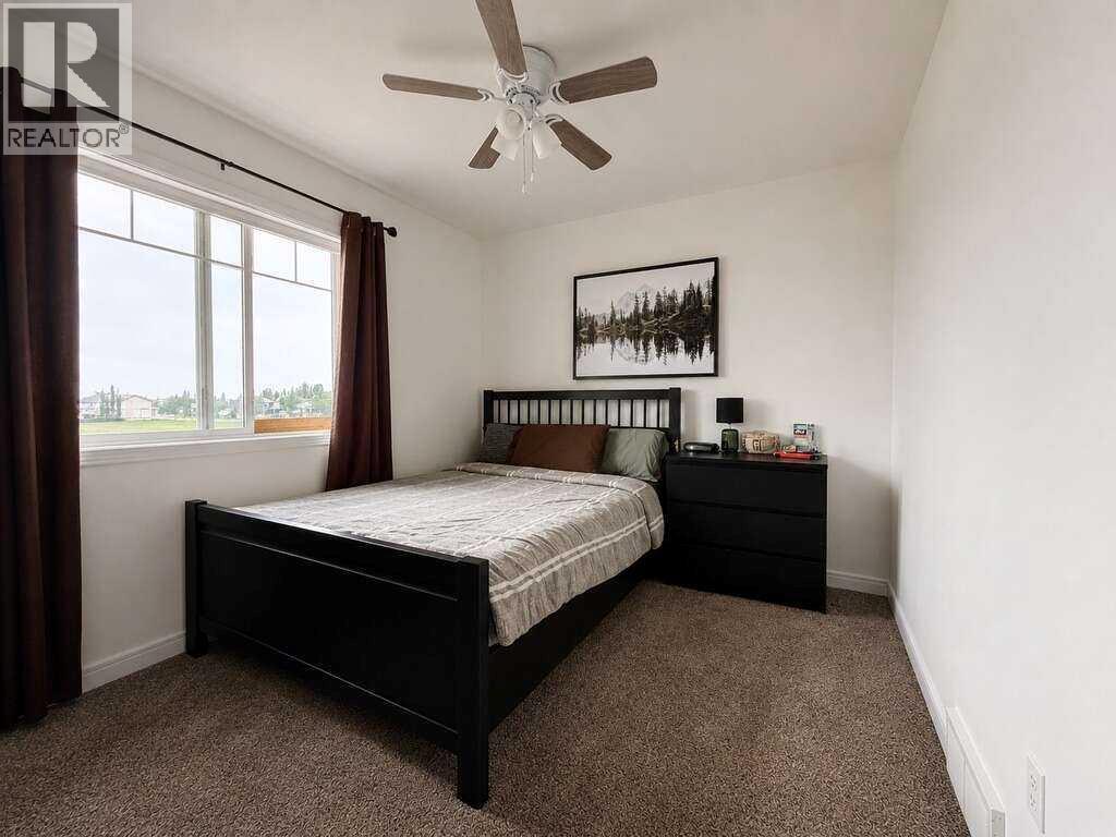 24 Brander Avenue NW, Langdon, Alberta  T0J 1X2 - Photo 21 - A2334594