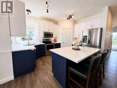 24 Brander Avenue NW, Langdon, Alberta  T0J 1X2 - Photo 8 - A2334594