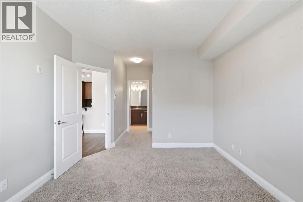 2208, 15 Sunset Square, Cochrane, Alberta T4C 0E7 - Photo 13 - A2332094