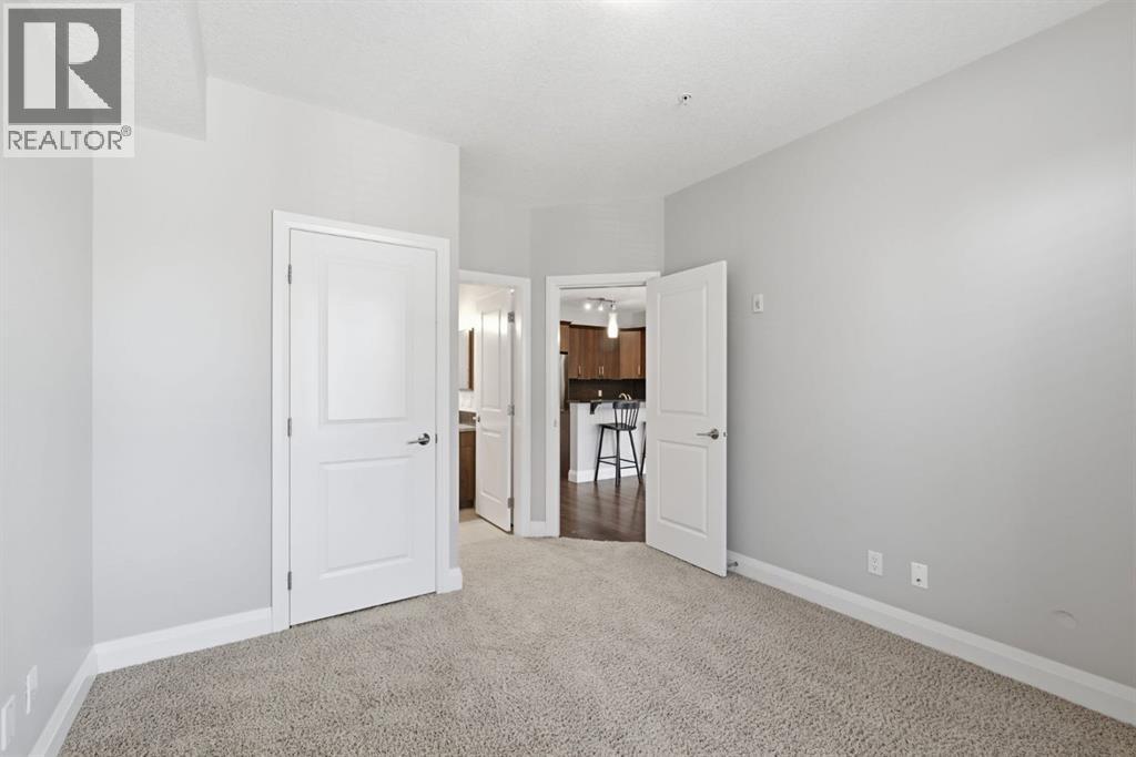 2208, 15 Sunset Square, Cochrane, Alberta T4C 0E7 - Photo 17 - A2332094