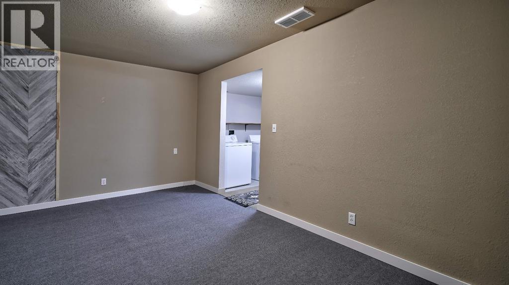 805, 620 Luxstone Landing SW, Airdrie, Alberta  T4B 0B6 - Photo 35 - A2300918