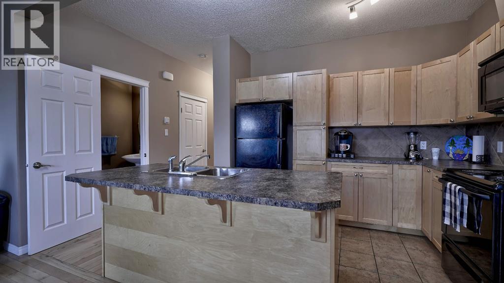 805, 620 Luxstone Landing SW, Airdrie, Alberta  T4B 0B6 - Photo 7 - A2300918