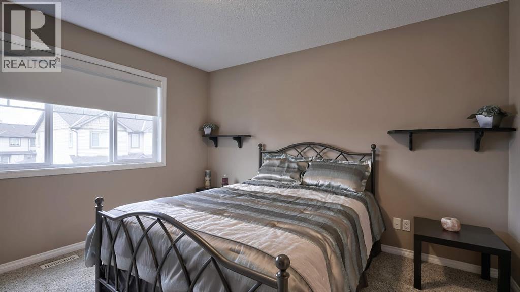 805, 620 Luxstone Landing SW, Airdrie, Alberta  T4B 0B6 - Photo 18 - A2300918