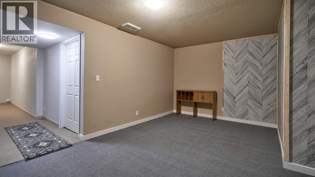 805, 620 Luxstone Landing SW, Airdrie, Alberta  T4B 0B6 - Photo 34 - A2300918