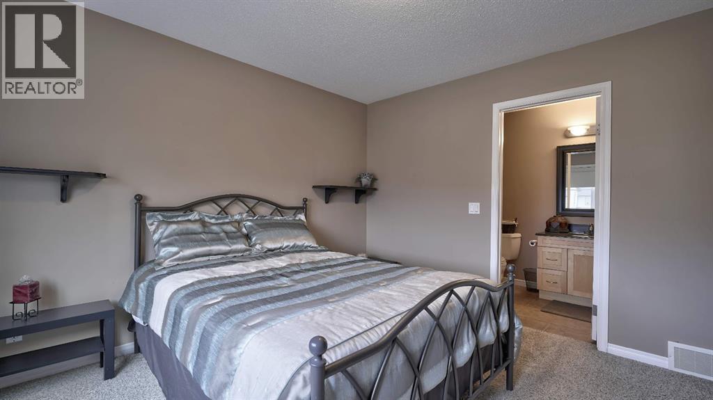 805, 620 Luxstone Landing SW, Airdrie, Alberta  T4B 0B6 - Photo 20 - A2300918