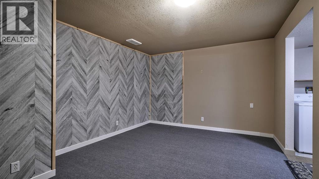 805, 620 Luxstone Landing SW, Airdrie, Alberta  T4B 0B6 - Photo 36 - A2300918