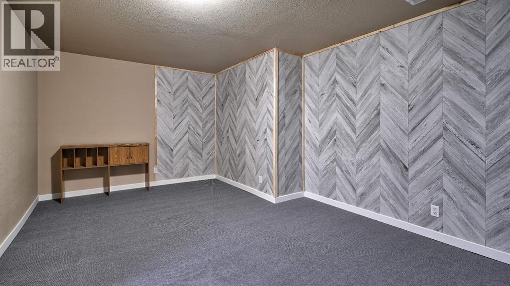 805, 620 Luxstone Landing SW, Airdrie, Alberta  T4B 0B6 - Photo 33 - A2300918