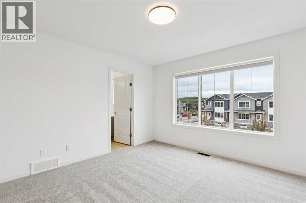 19 Emberside Park, Cochrane, Alberta  T4C 2L6 - Photo 20 - A2315683