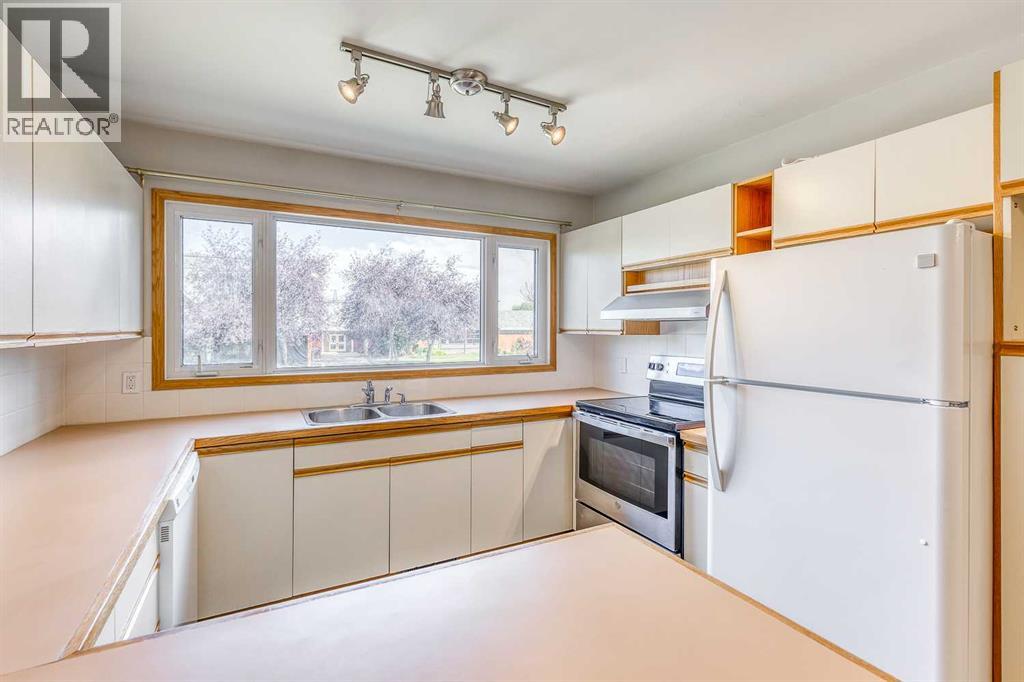 10619 Elbow Drive SW, Calgary, Alberta  T2W 1G3 - Photo 8 - A2327013