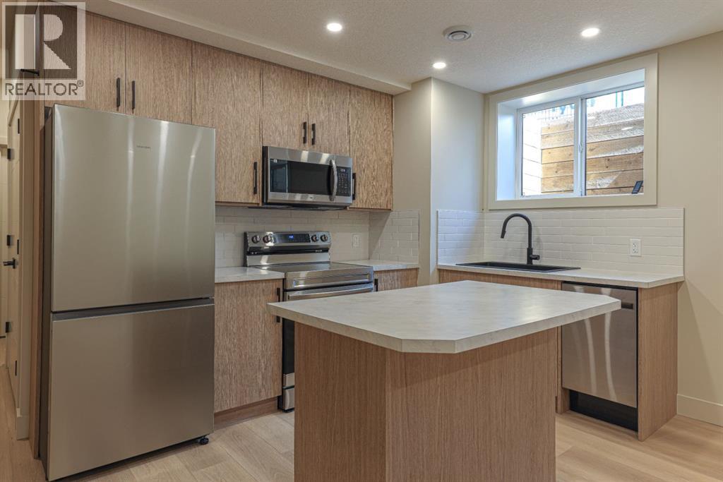 147 Heston Street Nw, Calgary, Alberta  T2K 2C5 - Photo 36 - A2329022